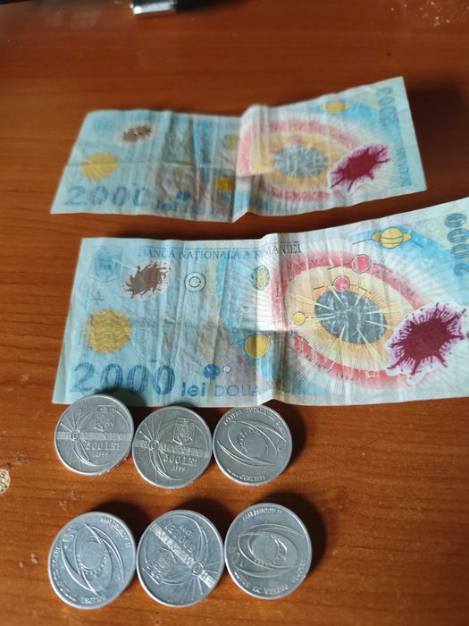 bancnote 2000 si monede eclipsa
