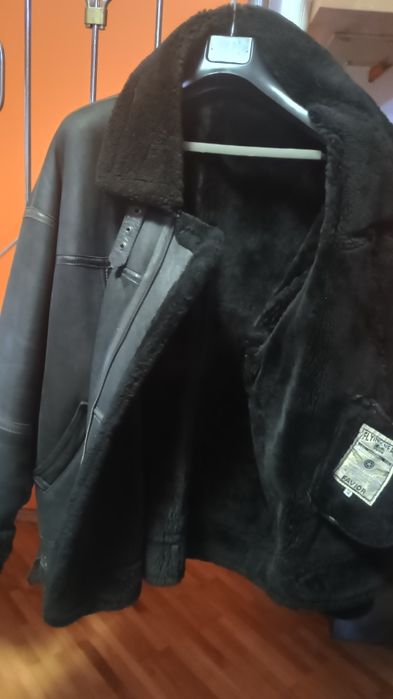 Geaca cojoc cu piele,culoare negru mărime 56,purtata