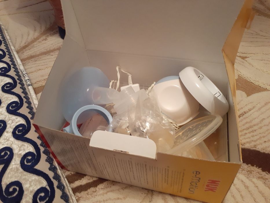 Продам молокоотсос е-    Motoon