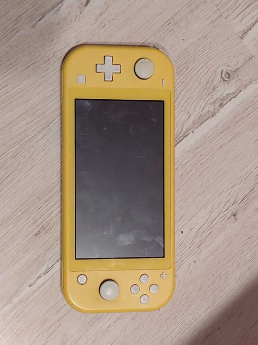 Vand Nintendo Switch Lite in stare foarte buna cu 8 jocuri, husa