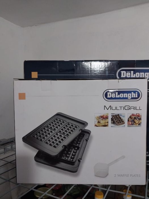 Мультигриль Delonghi с 2-мя сменными панелями