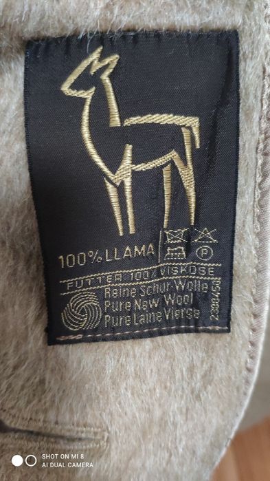 Шерстяное женское  пальто