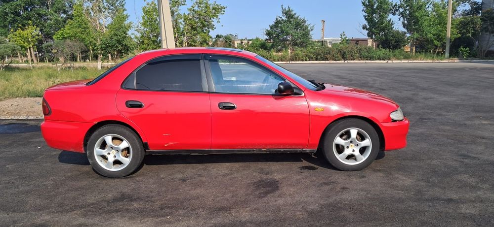 Мазда 323 год 1995