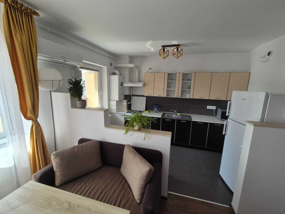 PF ofer spre închiriere apartament modern în zona The Office