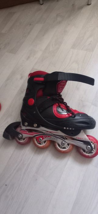 Роликовые коньки