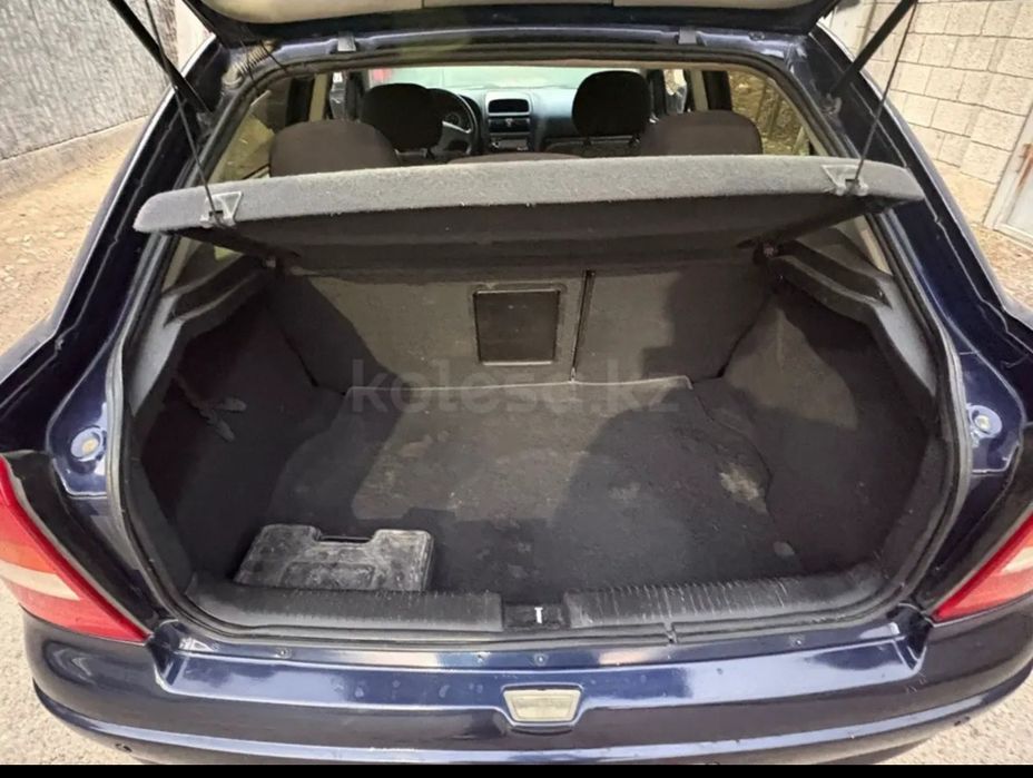 Опель астра машина