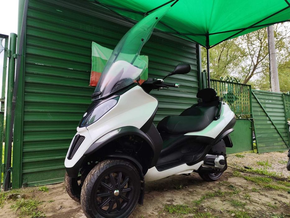 Пиаджо МП3 Piaggio MP3 300 кубика