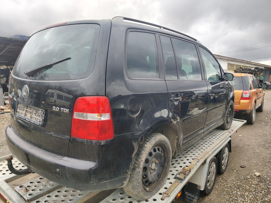 Piese motor cutie capota bara punte jug scaune faruri stopuri cârlig modul planșa trager radiatoare fuzeta modul caseta direcție  vw Touran 2.0tdi bmm