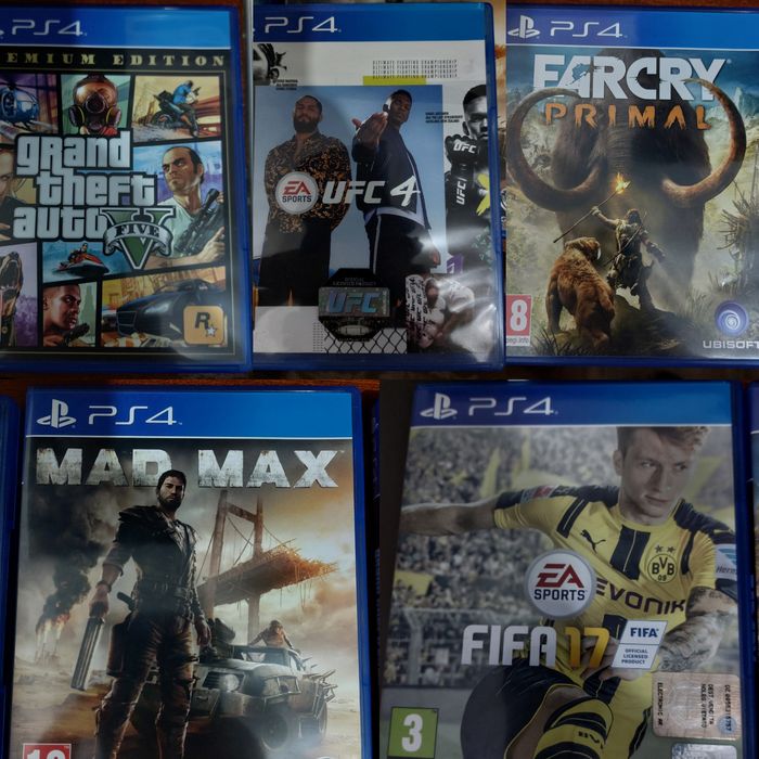 PlayStation 4 Pro 1TB + 2 controllere + 5 jocuri