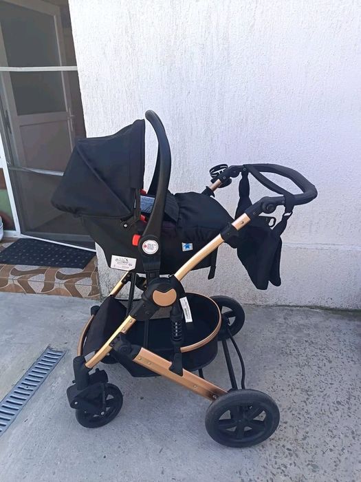Carucior 3 in 1 cu suspensii duble
