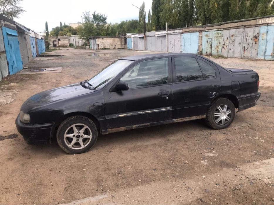 Нисан примьера.
