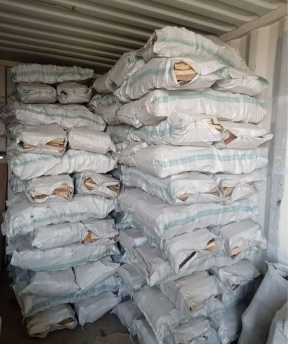 Дрова в мешках.