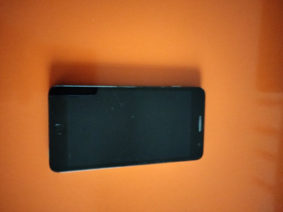 Телефон Alcatel one touch