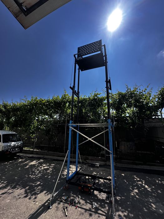 Elektironi lesa lift eskalator