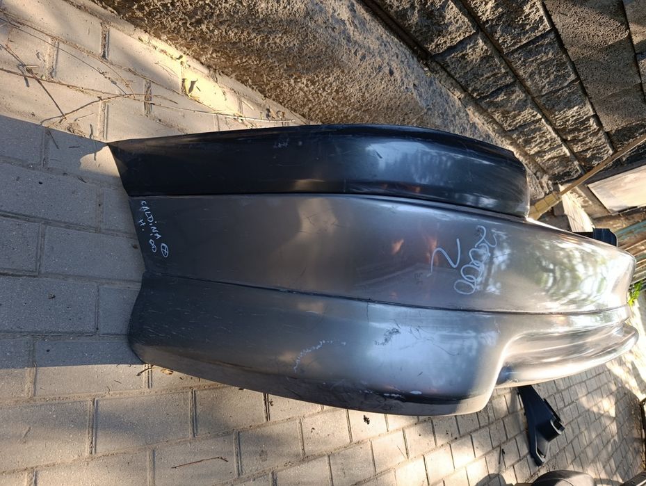 Задний бампер toyota caldina