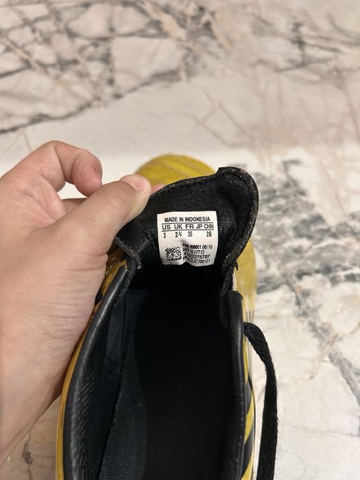 Бутони маратонки за футбол Адидас