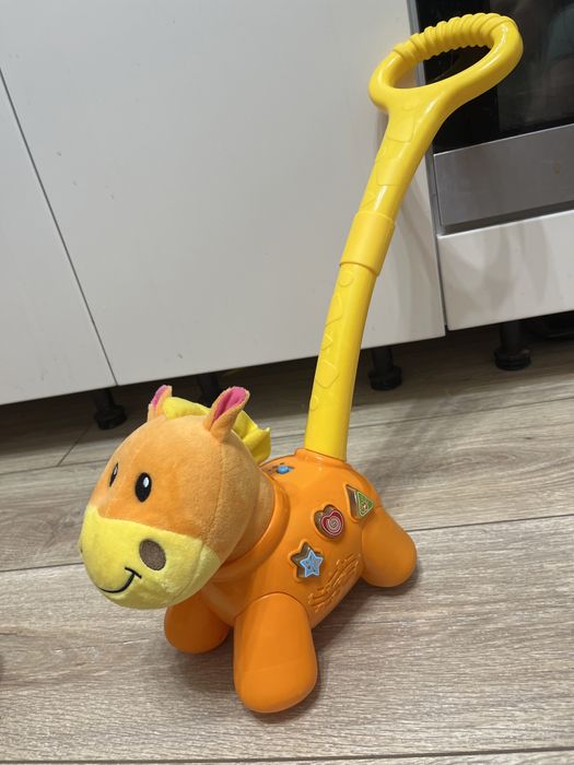 Музыкальные игрушки каталка планшет детский