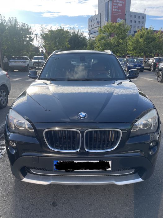 BMW x1 an 2010 ,Negru