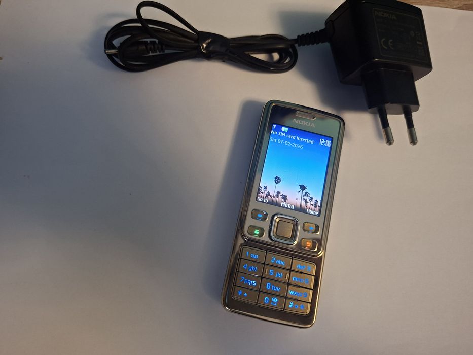 Nokia 6300 sirocco gold ca nou original + încărcător