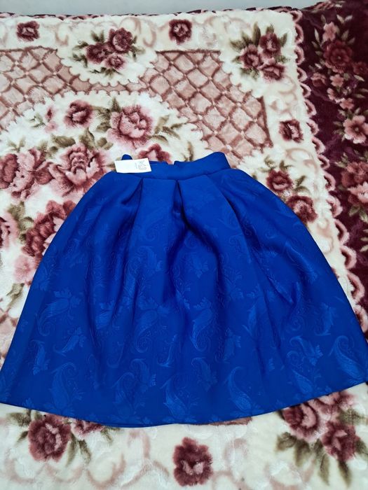 Одежды женские .