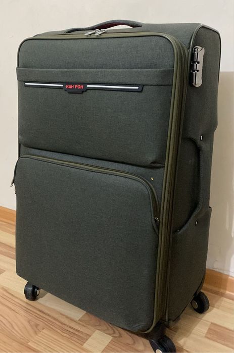 Продам новый чемодан