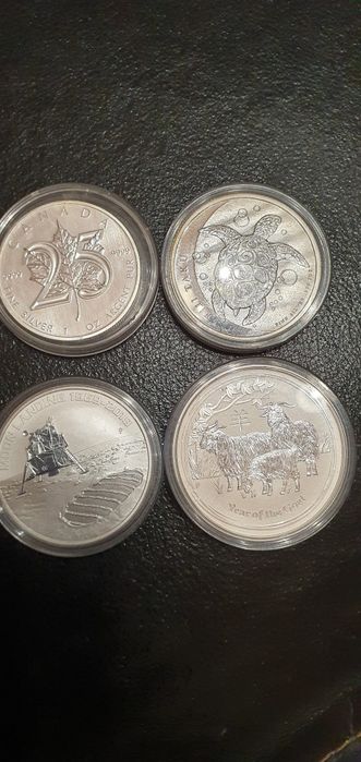 Lot 3  bucati (uncii )argint dolari U.S.A