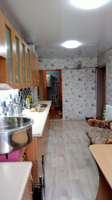 Шпальный дом с магазином