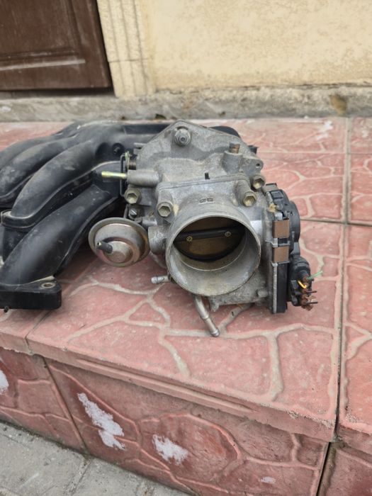 Коллектор с дроселем