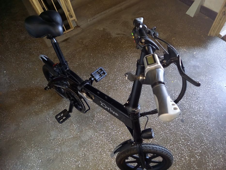 Bicicleta electrica pliabila  roti pe 14