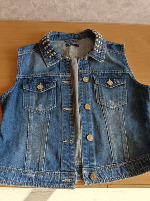 Продам жилет джинсовый,новый