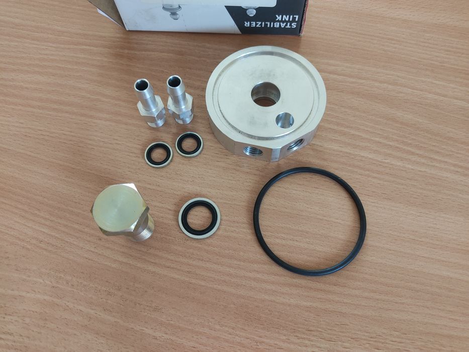 Продам новый адаптер для АКПП дополнительного  радиатора