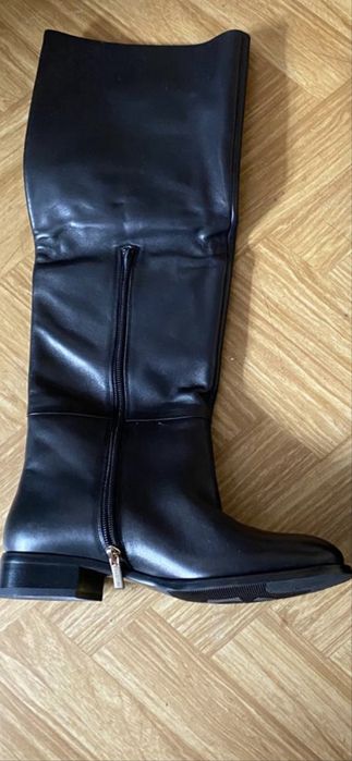 Продам зимние сапоги