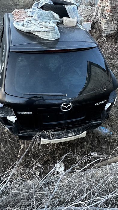 Запчасти на Мазда сх 7 (Американец)