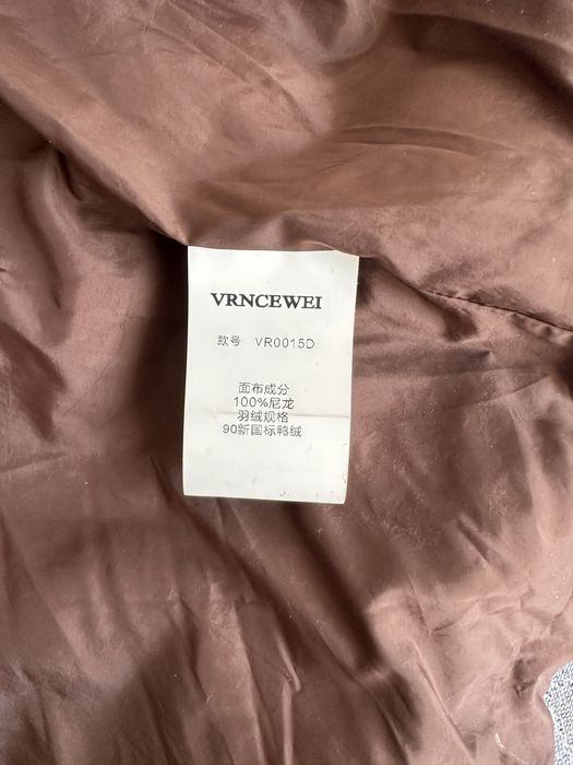 Женский пуховик длинный