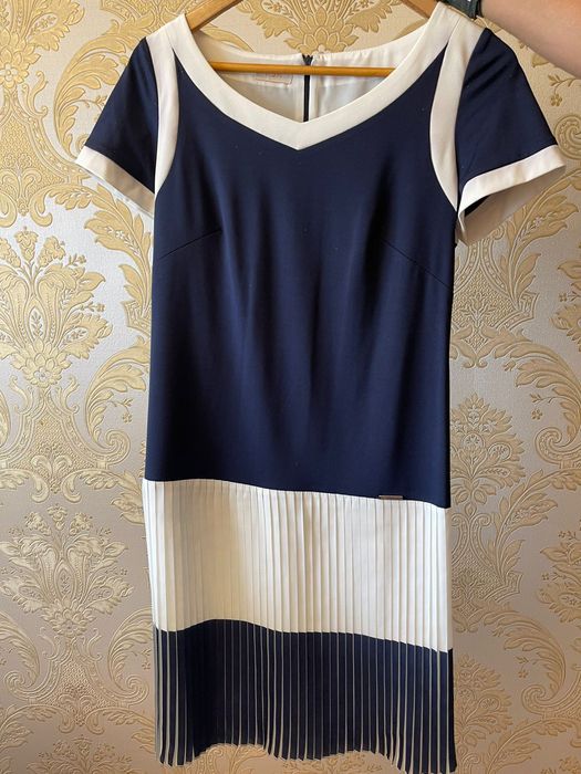 Женская/мужская одежда