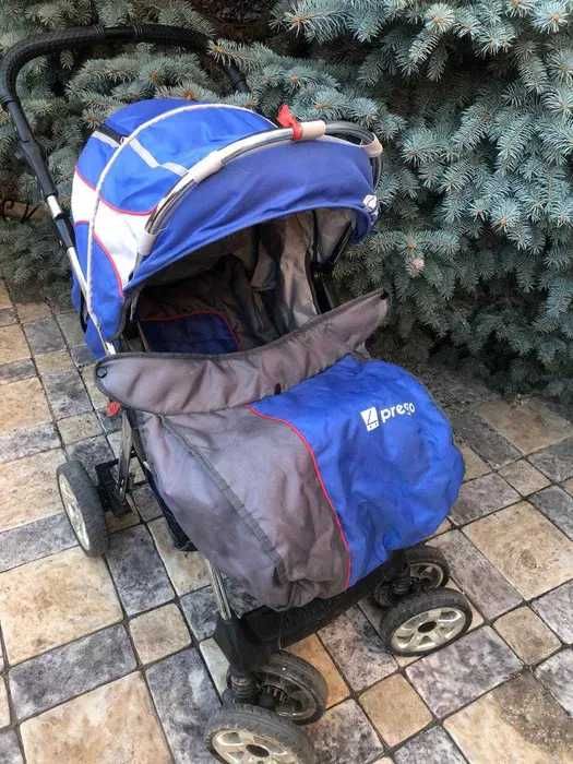 Коляска ЗИМА-лето навороченный поворотное колесо.