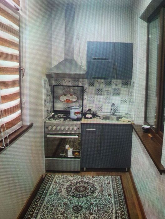 Чиланзар 19 1 комнатная переделанная 2 комнатную 1.5/6 балкон 40 квадр