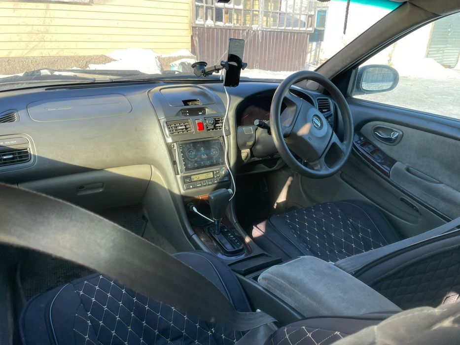 Ниссан сеферо А33