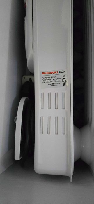 Продам масляный обогреватель Shivaki 12 секций, практический новый
