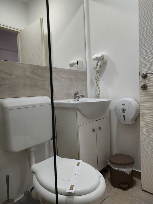 Garsoniere central regim hotelier