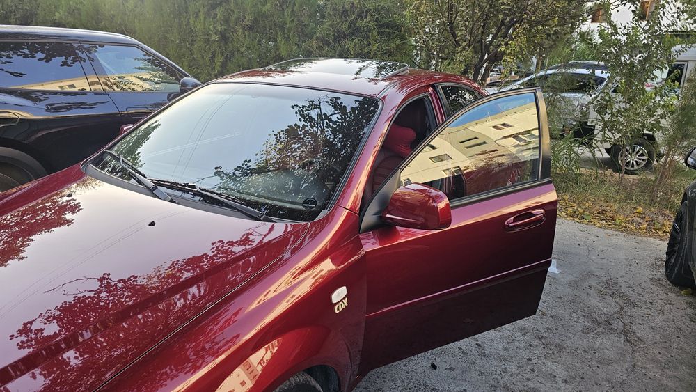 Gentra 2021 автомат коробка, цвет вишневый