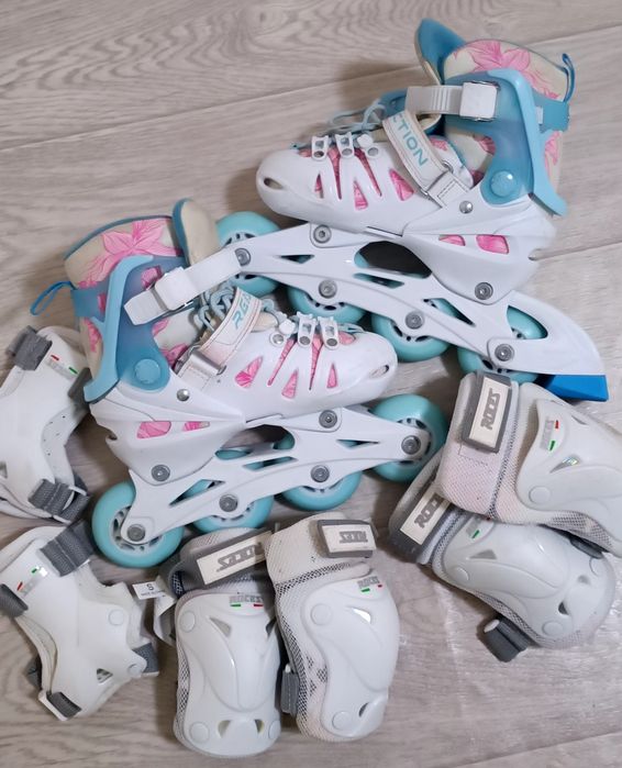 Роликовые коньки