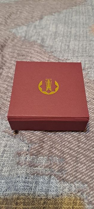 Продам серебряную монету Ai-Kun