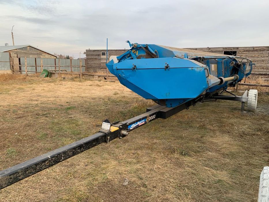 Очесывающая жатка