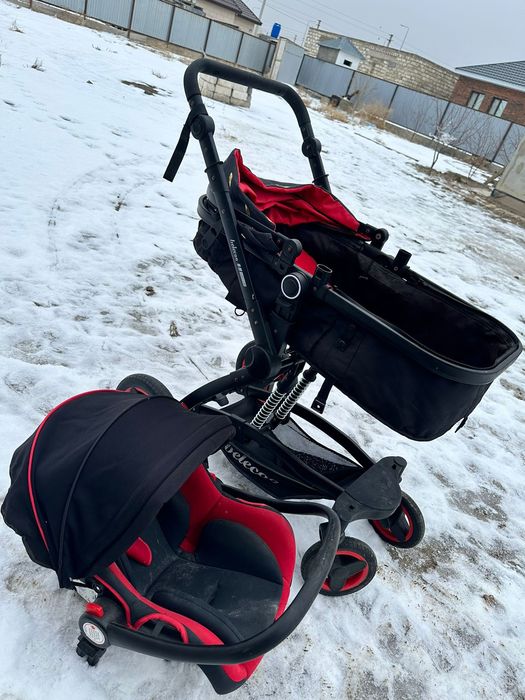 Продается коляска и кормящий столик