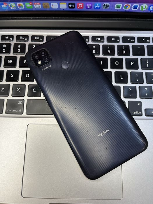 Телефон Xiaomi Redmi 9C