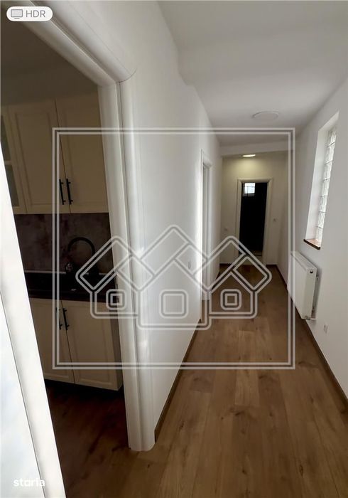 Apartament 2 camere, renovat, parcare, decomandat, etaj intermediar — fotografia 3