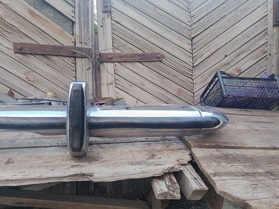 Бампер  передний газ 24 с клыками