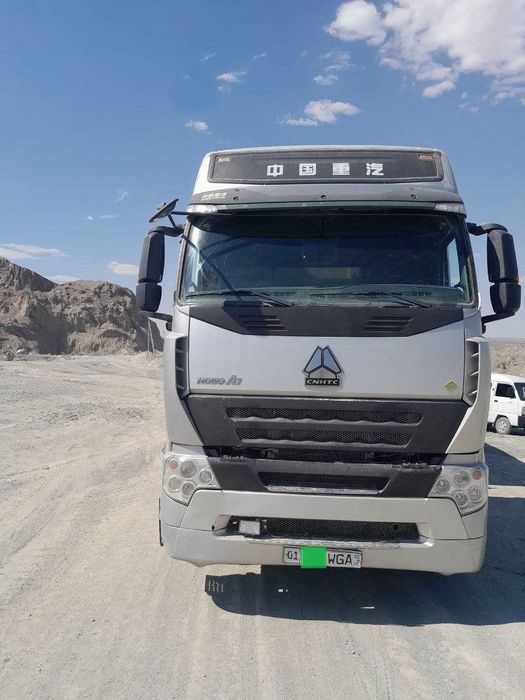 Тягач Howo A7 ва полуприцеп самосвал Sunhunk 40 куб сотилади!!!