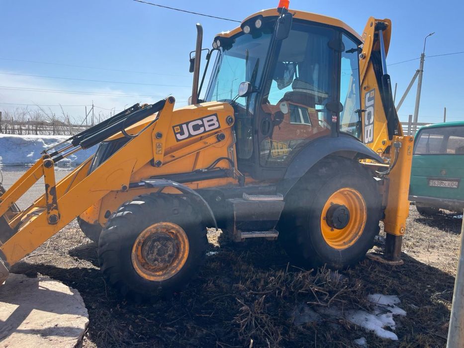 Услуги экскаватора-погрузчика.